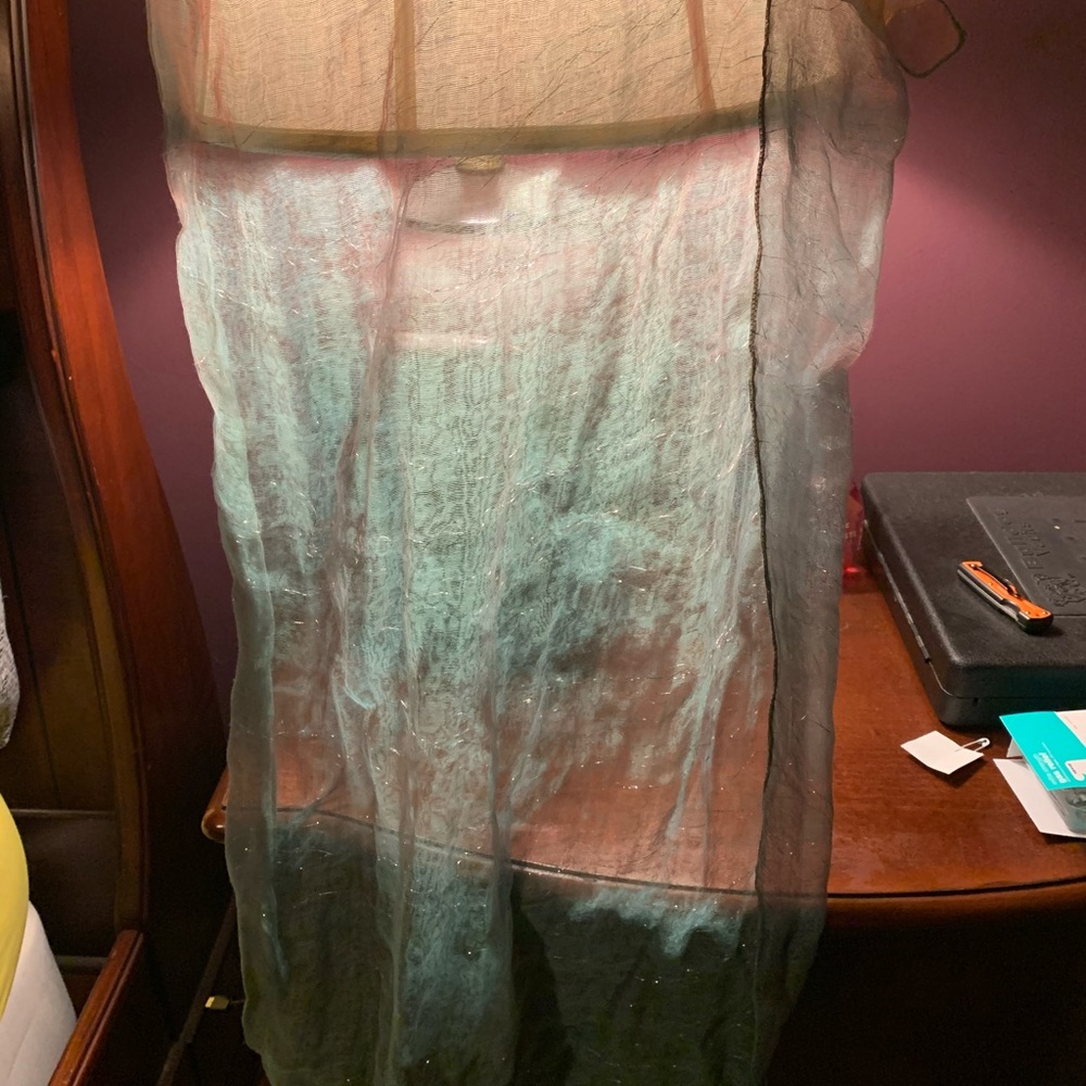 Sheer teal and brown scarf.